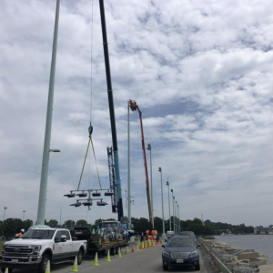 US Navy Crane lifting light fxture